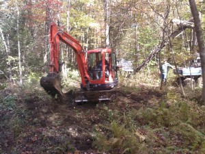 Dave installing a culvert and Scott watching. Sept 29, 2013.